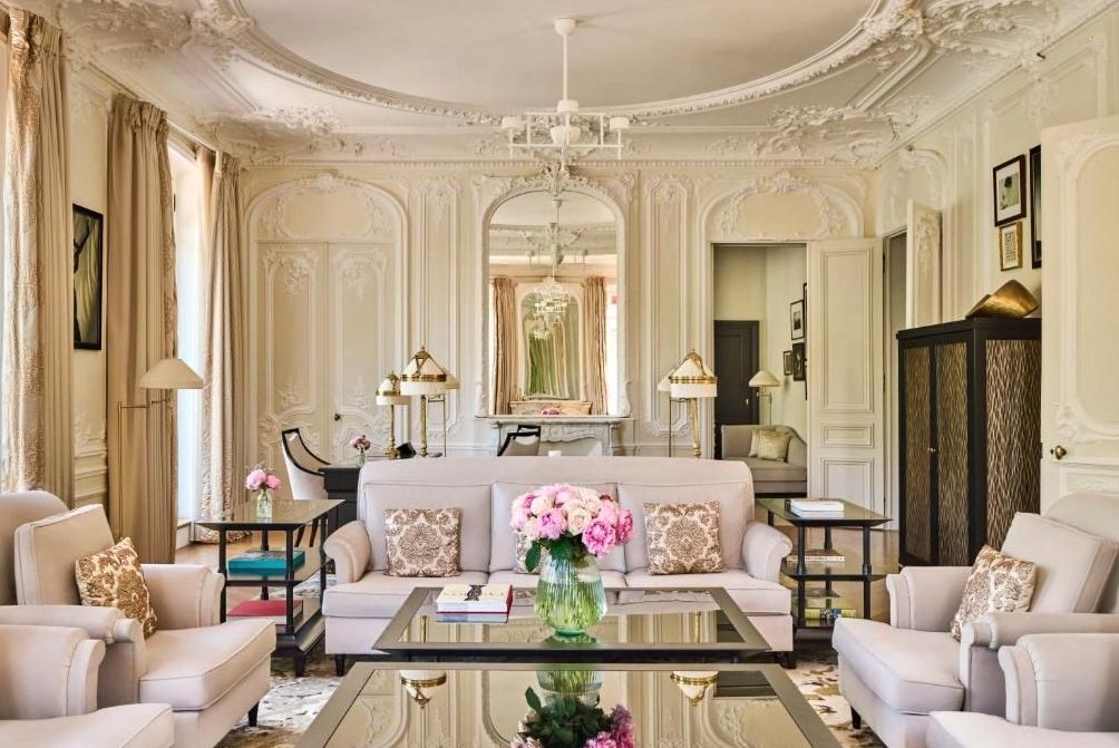 Joyful Radiance concierge welcoming a guest at an elegant desk
